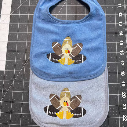 Stitch-out: Football Turkey Filled Machine Embroidery Design Embroidered on Two Onesies