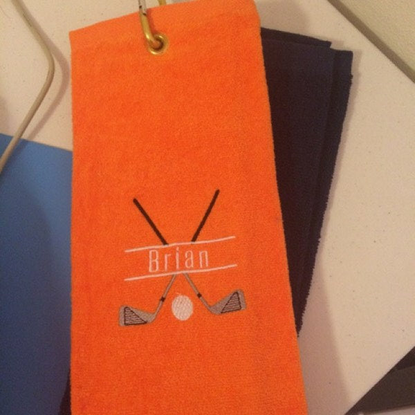 Stitch-out: Golf Club Split Machine Embroidery Design Embroidered on Orange Fabric