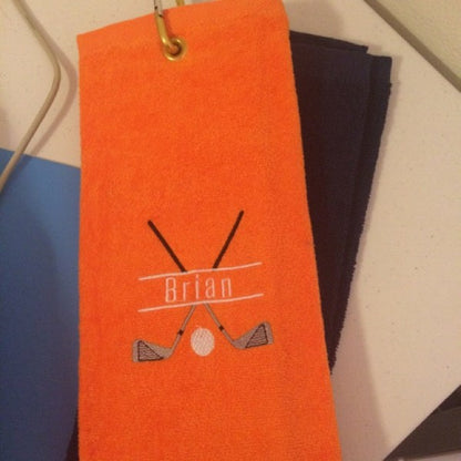 Stitch-out: Golf Club Split Machine Embroidery Design Embroidered on Orange Fabric