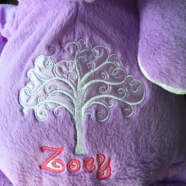 Tree Of Life Machine Embroidery stitch-out: Purple blanket with embroidered tree and 'Zoey' text