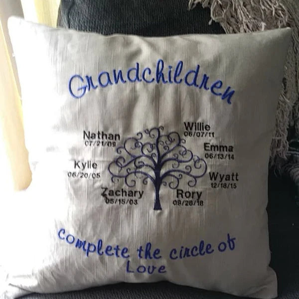 Tree Of Life Machine Embroidery stitch-out: Decorative pillow with tree design and names, featuring the text 'Grandchildren complete the circle