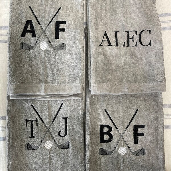Golf Club Embroidery design stitch-out: Set of gray towels with personalized monograms and names on a striped background