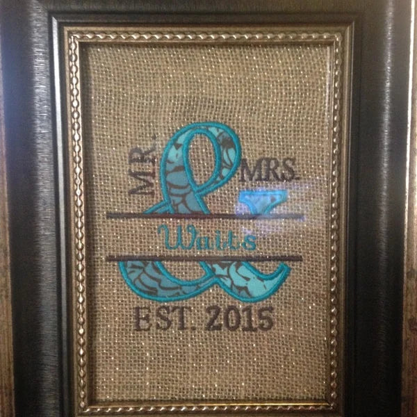 Mr & Mrs Applique Embroidery Digitized Design Design Pattern stitch-out: Framed burlap sign with 'Mr. & Mrs. Wills EST. 2015' text and decorative elements.
