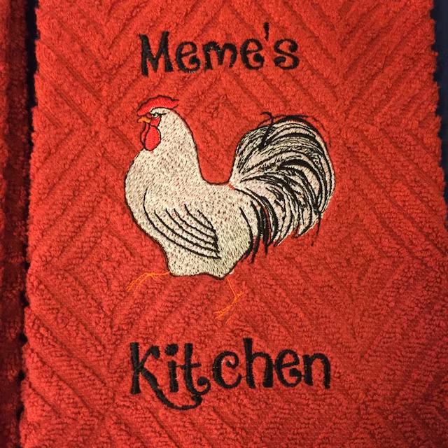 White Rooster Machine Embroidery Design stitch-out: White rooster stitched out on a towel