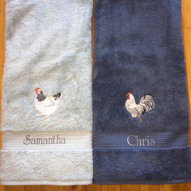 White Rooster Machine Embroidery Design stitch-out: White rooster stitched out on towels.