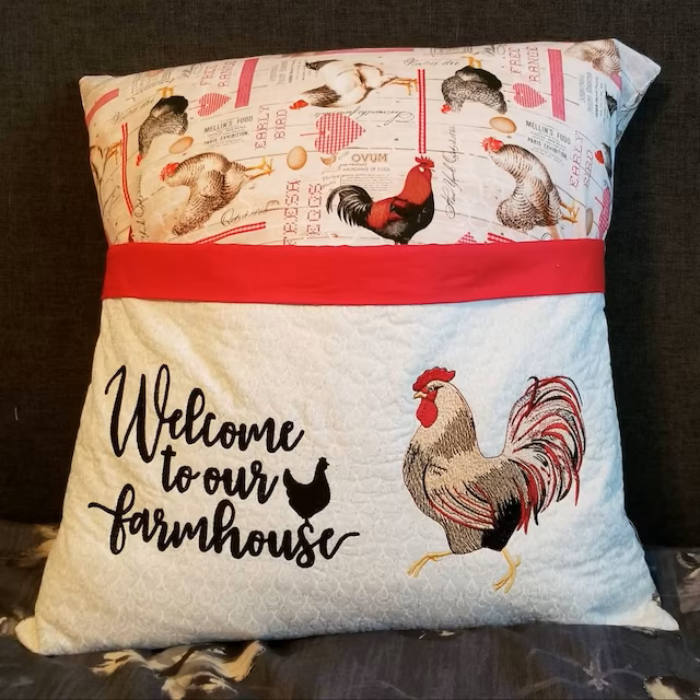 White Rooster Machine Embroidery Design stitch-out: White rooster embroidery design stitch out on a pillow.