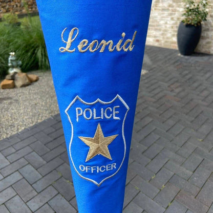Stitch-out: Police Badge Machine Embroidery Design Embroidered on Blue Fabric and Personalized with a First Name