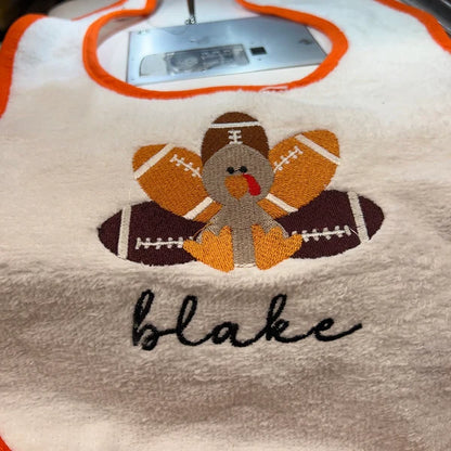 Stitch-out: Football Turkey Machine Embroidery Design Embroidered on Baby Bib Personalized with Name